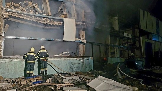 Russia-Ukraine War: Ukrainian emergency workers examine the site of the Russian rocket attack in central Odesa, Ukraine. (AP)