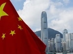 The Chinese national flag is seen in front of the financial district Central on the Chinese National Day in Hong Kong, China.