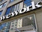 FILE PHOTO: A WeWork logo is seen outside its offices in San Francisco, California, U.S. September 30, 2019.  REUTERS/Kate Munsch/File Photo/File Photo