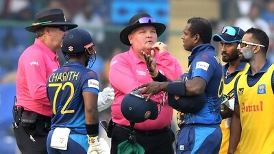 Sri Lanka's Angelo Mathews in a discussion with the umpires after being timed out during the match against Bangladesh in the ICC Men's Cricket World Cup 2023, at Arun Jaitley Stadium in New Delhi on Monday. (ANI) Sri Lanka's Angelo Mathews in a discussion with the umpires after being timed out during the match against Bangladesh in the ICC Men's Cricket World Cup 2023, at Arun Jaitley Stadium in New Delhi on Monday. (ANI)