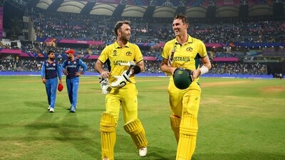 Australia's Glenn Maxwell and captain Pat Cummins celebrate the team's victory against Afghanistan (ANi) Australia's Glenn Maxwell and captain Pat Cummins celebrate the team's victory against Afghanistan (ANi)