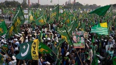 Pakistan Elections: Supporters of Pakistan's former Prime Minister Nawaz Sharif attend a welcoming rally for their leader, in Lahore, Pakistan. (AP) Pakistan Elections: Supporters of Pakistan's former Prime Minister Nawaz Sharif attend a welcoming rally for their leader, in Lahore, Pakistan. (AP)