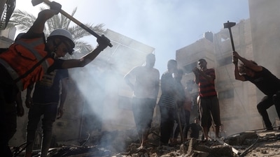 Israel-Hamas War: Palestinians look for survivors under the rubble of a destroyed building following an Israeli airstrike in Khan Younis refugee camp, southern Gaza Strip. (AP) Israel-Hamas War: Palestinians look for survivors under the rubble of a destroyed building following an Israeli airstrike in Khan Younis refugee camp, southern Gaza Strip. (AP)