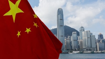 The Chinese national flag is seen in front of the financial district Central on the Chinese National Day in Hong Kong, China. (REUTERS)