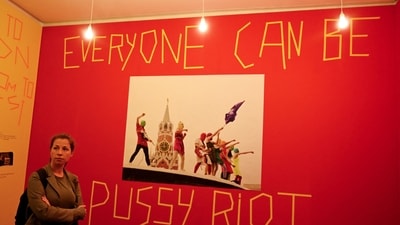 A woman visits Pussy Riot's first ever museum exhibition at Louisiana Museum of Modern Art in Humlebaek, outside Copenhagen. (AFP)