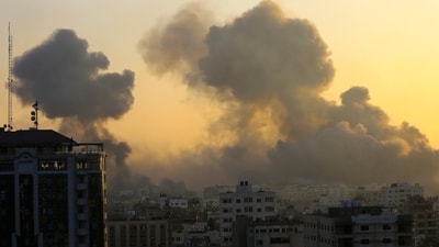 Israel-Hamas War: Smoke rises following Israeli airstrikes in Gaza City. (AP) Israel-Hamas War: Smoke rises following Israeli airstrikes in Gaza City. (AP)