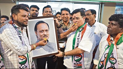 NCP workers of Ajit Pawar faction celebrate outside NCP office in Thane after NCP (Ajit Pawar faction) victory in Maharashtra gram panchyat elections. (Praful Gangurde / HT Photo) NCP workers of Ajit Pawar faction celebrate outside NCP office in Thane after NCP (Ajit Pawar faction) victory in Maharashtra gram panchyat elections. (Praful Gangurde / HT Photo)