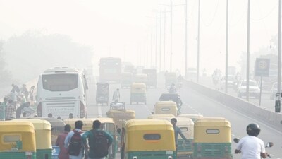 Commuters on a road amid low visibility due to smog in New Delhi. Pollution levels in Delhi-NCR on Monday morning were recorded around seven to eight times above the government-prescribed safe limit. (PTI) Commuters on a road amid low visibility due to smog in New Delhi. Pollution levels in Delhi-NCR on Monday morning were recorded around seven to eight times above the government-prescribed safe limit. (PTI)