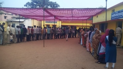 Voters wait in queues to cast their votes for the 1st phase of Chhattisgarh Assembly elections in Kanker district. (PTI)