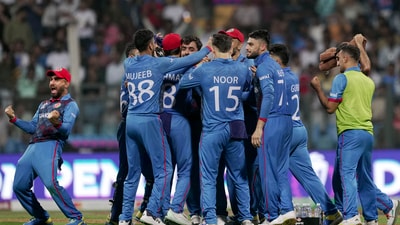 Afghanistan's Rashid Khan with teammates celebrates the wicket of Australia's Marcus Stoinis (PTI) Afghanistan's Rashid Khan with teammates celebrates the wicket of Australia's Marcus Stoinis (PTI)