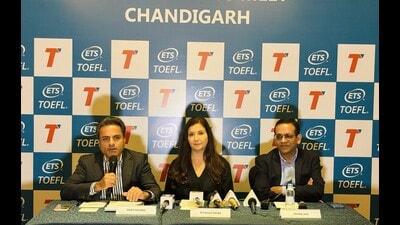 Rohit Sharma (left) from Educational Testing Service addressing the media in Chandigarh. (HT Photo)
