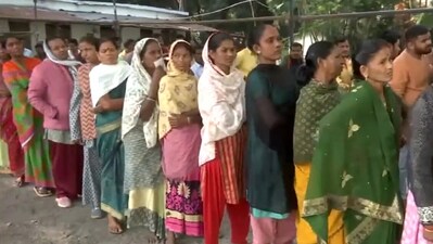 Voters queue up outside a polling booth in Kondagaon as they await their turn to cast a vote in the first phase of Assembly elections. (ANI) Voters queue up outside a polling booth in Kondagaon as they await their turn to cast a vote in the first phase of Assembly elections. (ANI)