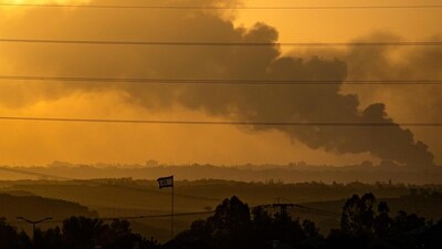 Israel-Hamas War: Smoke rising from northern Gaza during shelling by Israeli forces amid ongoing battle. (AFP) Israel-Hamas War: Smoke rising from northern Gaza during shelling by Israeli forces amid ongoing battle. (AFP)