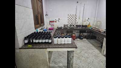 The first meth lab was found to be running from a house in Theta-2 Sector in Greater Noida, while the second lab was busted in Omega-1 Sector. The total value of the methamphetamine or MDMA seized was estimated to be of over  ₹300 crore, said police. (HT Photo)