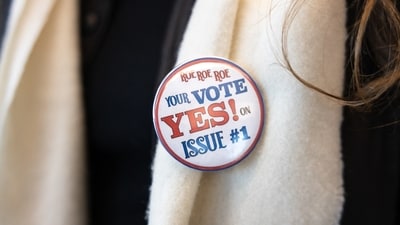 A woman wears a pro-choice button to a canvassing meeting ahed of the election in Columbus, Ohio on November 5, 2023. As the clock ticks down on a high-stakes vote in the US state of Ohio, activists are out in force urging voters to decide whether to explicitly enshrine the right to abortion in the state constitution. (Photo by Megan JELINGER / AFP) (AFP) A woman wears a pro-choice button to a canvassing meeting ahed of the election in Columbus, Ohio on November 5, 2023. As the clock ticks down on a high-stakes vote in the US state of Ohio, activists are out in force urging voters to decide whether to explicitly enshrine the right to abortion in the state constitution. (Photo by Megan JELINGER / AFP) (AFP)