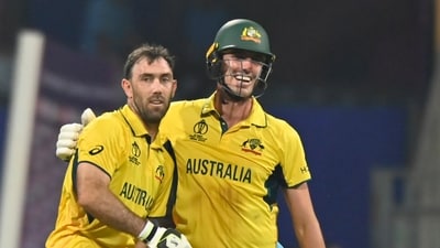 Glenn Maxwell along with  Pat Cummins of Australia celebrates 200 and win against Afghanistan (Hindustan Times)