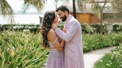 Amala Paul and Jagat Desai married on November 5 and posed for a dreamy wedding photoshoot at Grand Hyatt Kochi Bolgatty. The couple gave different poses, held hands and kissed at they posed together on their wedding day. 