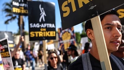 SAG-AFTRA members and supporters picket outside Paramount Studios during their strike against the Hollywood studios. (Getty Images via AFP) SAG-AFTRA members and supporters picket outside Paramount Studios during their strike against the Hollywood studios. (Getty Images via AFP)