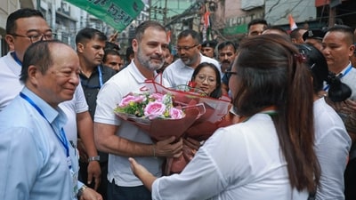 Congress leader Rahul Gandhi being greeted by supporters while leading the 'Padyatra' from Chanmari to Raj Bhawan during an election campaign for party candidates ahead of the Mizoram assembly elections, in Aizawl. (ANI) Congress leader Rahul Gandhi being greeted by supporters while leading the 'Padyatra' from Chanmari to Raj Bhawan during an election campaign for party candidates ahead of the Mizoram assembly elections, in Aizawl. (ANI)