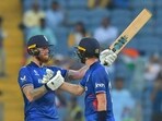 England's Ben Stokes celebrates his century with Chris Woakes 