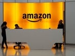 In this Feb. 14, 2019, file photo people stand in the lobby for Amazon offices in New York. Amazon is kicking off its annual security-focused cloud computing conference on Tuesday amid a slowdown in its profitable cloud business Amazon Web Services, or AWS. (AP Photo/Mark Lennihan, File) In this Feb. 14, 2019, file photo people stand in the lobby for Amazon offices in New York. Amazon is kicking off its annual security-focused cloud computing conference on Tuesday amid a slowdown in its profitable cloud business Amazon Web Services, or AWS. (AP Photo/Mark Lennihan, File)