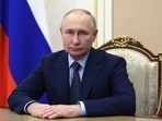 Russian president Vladimir Putin speaks during a video address.