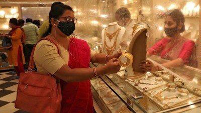 Purchasing gold and silver on this auspicious day is believed to attract wealth and prosperity into one's home. (REUTERS)