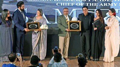 Chief of Army Staff General Manoj Pande and wife Archana Pande being felicitated by film producer Ronnie Screwvala and actor Vicky Kaushal, respectively, during the trailer launch of the upcoming movie Sam Bahadur in New Delhi on Tuesday. Director Meghna Gulzar and actors Sanya Malhotra and Fatima Sana Sheikh are also present. Chief of Army Staff General Manoj Pande and wife Archana Pande being felicitated by film producer Ronnie Screwvala and actor Vicky Kaushal, respectively, during the trailer launch of the upcoming movie Sam Bahadur in New Delhi on Tuesday. Director Meghna Gulzar and actors Sanya Malhotra and Fatima Sana Sheikh are also present.
