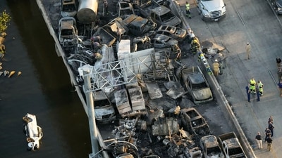 In this aerial photo, responders are seen near wreckage in the aftermath of a multi-vehicle pileup on I-55 in Manchac, La., Monday, Oct. 23, 2023. A “superfog” of smoke from south Louisiana marsh fires and dense morning fog caused multiple traffic crashes involving scores of cars. (AP) In this aerial photo, responders are seen near wreckage in the aftermath of a multi-vehicle pileup on I-55 in Manchac, La., Monday, Oct. 23, 2023. A “superfog” of smoke from south Louisiana marsh fires and dense morning fog caused multiple traffic crashes involving scores of cars. (AP)