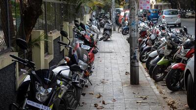 According to the orders, parking is now allowed on both sides of the road from the Band Garden water supply department to the Wadgaonsheri tanker filling centre, with a distance of 100 meters on either side of the gate. (REPRESENTATIVE PHOTO)