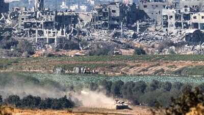 Israel-Hamas War: An Israeli army battle tank moves at a position in the Gaza Strip across the border from southern Israel. (AFP) Israel-Hamas War: An Israeli army battle tank moves at a position in the Gaza Strip across the border from southern Israel. (AFP)
