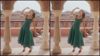 Her dress features a plunging neckline, corset detailing, a figure-hugging fit, a midi hemline and a beautiful flare at the bottom that exudes grace and elegance. (Instagram/@bhumipednekar)