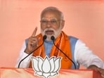Prime Minister Narendra Modi speaks during a public meeting ahead of Madhya Pradesh elections, in Satna