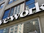 A WeWork logo is seen outside its offices in San Francisco, California, U.S.