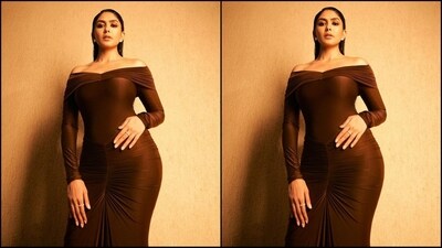 In terms of accessories, Mrunal kept it minimal to let her outfit shine and styled her look with just a pair of diamond studded earrings and statement rings adorning her fingers. (Instagram/@mrunalthakur) In terms of accessories, Mrunal kept it minimal to let her outfit shine and styled her look with just a pair of diamond studded earrings and statement rings adorning her fingers. (Instagram/@mrunalthakur)