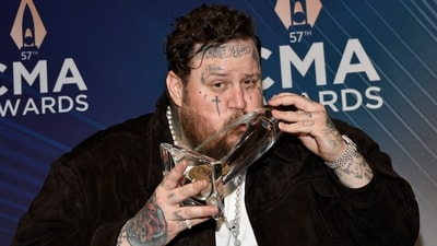 Jelly Roll poses with the award for new artist of the year in the press room at the 57th Annual CMA Awards on Wednesday, Nov. 8, 2023, at the Bridgestone Arena in Nashville, Tenn. (Photo by Evan Agostini/Invision/AP) (Evan Agostini/Invision/AP) Jelly Roll poses with the award for new artist of the year in the press room at the 57th Annual CMA Awards on Wednesday, Nov. 8, 2023, at the Bridgestone Arena in Nashville, Tenn. (Photo by Evan Agostini/Invision/AP) (Evan Agostini/Invision/AP)