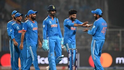 India's captain Rohit Sharma (R) celebrates with teammates after their win at the end of the 2023 ICC Men's Cricket World Cup one-day international (ODI) match against South Africa (AFP) India's captain Rohit Sharma (R) celebrates with teammates after their win at the end of the 2023 ICC Men's Cricket World Cup one-day international (ODI) match against South Africa (AFP)