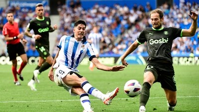 Real Sociedad's Spanish forward Carlos Fernandez vies with Girona's Dutch defender Daley Blind during a La Liga match. (AFP) Real Sociedad's Spanish forward Carlos Fernandez vies with Girona's Dutch defender Daley Blind during a La Liga match. (AFP)