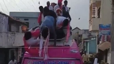 KTR with a scarf around his neck seen balancing with his hands as the vehicle suddenly stopped.