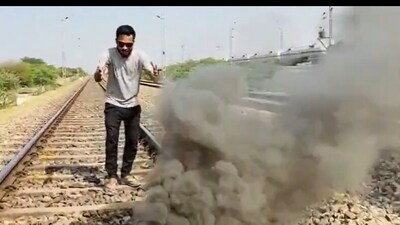YouTuber 'Stupid DTS' seen burning crackers on a railway track, (X/@Trains of India) YouTuber 'Stupid DTS' seen burning crackers on a railway track, (X/@Trains of India)