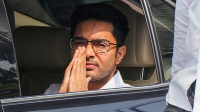 TMC MP Abhishek Banerjee leaves from his Kalighat residence to appear before the Enforcement Directorate in connection with alleged teachers recruitment scam in Kolkata on November 9. (PTI) TMC MP Abhishek Banerjee leaves from his Kalighat residence to appear before the Enforcement Directorate in connection with alleged teachers recruitment scam in Kolkata on November 9. (PTI)