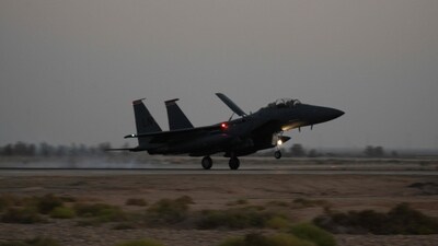 In this image courtesy of the US Air Force, a US Air Force F-15E Strike Eagle assigned to the 494th Expeditionary Fighter Squadron lands in the US Central Command area of responsibility, October 13, 2023. (Photo by Josephine Pepin / US AIR FORCE / AFP) In this image courtesy of the US Air Force, a US Air Force F-15E Strike Eagle assigned to the 494th Expeditionary Fighter Squadron lands in the US Central Command area of responsibility, October 13, 2023. (Photo by Josephine Pepin / US AIR FORCE / AFP)