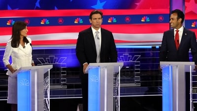 Former South Carolina Governor Nikki Haley and former biotech executive Vivek Ramaswamy spar as Florida Governor Ron DeSantis listens at the third Republican candidates' U.S. presidential debate of the 2024 U.S. presidential campaign hosted by NBC News at the Adrienne Arsht Center for the Performing Arts in Miami, Florida, U.S., November 8, 2023. REUTERS/Mike Segar (REUTERS)