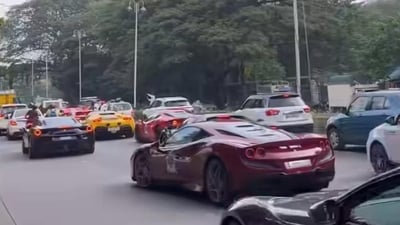 Fleet of Ferrari luxury cars hit Bengaluru traffic wall. Fleet of Ferrari luxury cars hit Bengaluru traffic wall.
