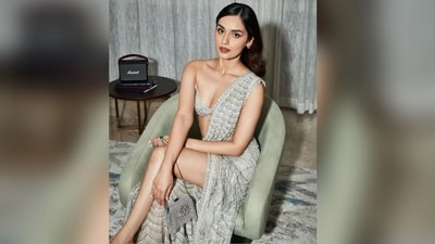 Her saree features a striking ice blue-silver shade, netted crepe fabric adorned with intricate resham and sequin hand work. She paired it with a unique off-the-shoulder, plunging neckline blouse. The side slit in her saree added the oomph factor to her look. (Instagram/@manushi_chhillar) Her saree features a striking ice blue-silver shade, netted crepe fabric adorned with intricate resham and sequin hand work. She paired it with a unique off-the-shoulder, plunging neckline blouse. The side slit in her saree added the oomph factor to her look. (Instagram/@manushi_chhillar)