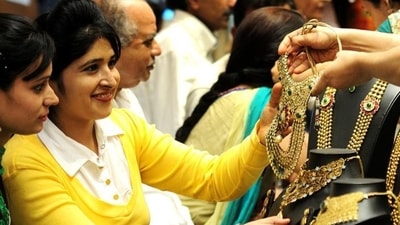 Buying of gold is especially considered of great significance during Dhantrayodashi as it is considered a symbol of prosperity and wealth and is said to bring stability and good luck (Ravi Kumar/HT) Buying of gold is especially considered of great significance during Dhantrayodashi as it is considered a symbol of prosperity and wealth and is said to bring stability and good luck (Ravi Kumar/HT)