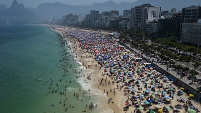 People flock to the Ipanema beach to beat the extreme heat in Rio de Janeiro, Brazil, in September. (CREDIT: AP) People flock to the Ipanema beach to beat the extreme heat in Rio de Janeiro, Brazil, in September. (CREDIT: AP)