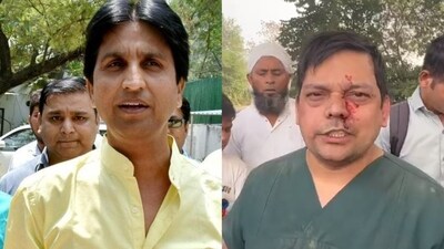 Poet Kumar Vishwas (Left) and the doctor involved in the incident. Poet Kumar Vishwas (Left) and the doctor involved in the incident.