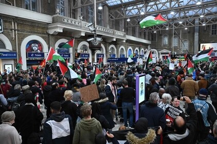 Protesters take part in a protest inside Charing Cross station following the 'London Rally For Palestine' in, central London on November 4, 2023. (AFP) Protesters take part in a protest inside Charing Cross station following the 'London Rally For Palestine' in, central London on November 4, 2023. (AFP)
