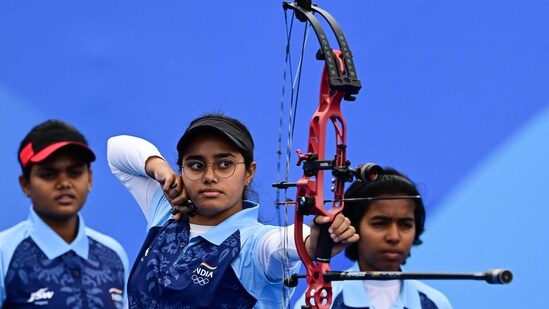 India's Parneet Kaur (C) competes in the archery compound women's team event at Aisan Games (AFP)
